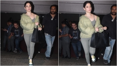 Regarding the airport look, Tamannaah chose a comfy and stylish athleisure outfit featuring a light grey sports bra, matching tights and a light green puffer jacket. The star showed her fans how to glam up everyday looks with her stylish ensemble. The whole set is the perfect addition to your activewear closet. (HT Photo/Varinder Chawla) Regarding the airport look, Tamannaah chose a comfy and stylish athleisure outfit featuring a light grey sports bra, matching tights and a light green puffer jacket. The star showed her fans how to glam up everyday looks with her stylish ensemble. The whole set is the perfect addition to your activewear closet. (HT Photo/Varinder Chawla)