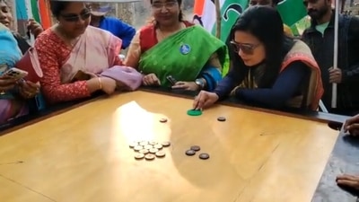 Mahua Moitra playing carrom on Thursday in West Bengal's Chapra 1. (@MahuaMoitra/ Twitter)