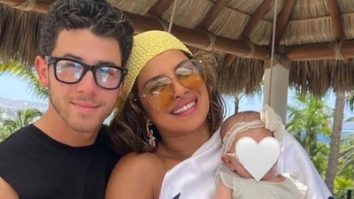 Priyanka Chopra and Nick Jonas with Malti Marie Chopra Jonas. Priyanka Chopra and Nick Jonas with Malti Marie Chopra Jonas.