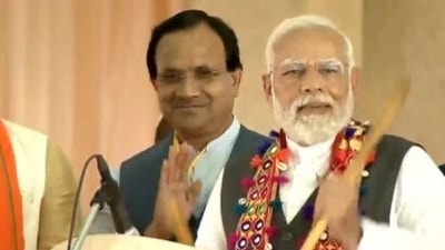 PM Modi plays traditional drum during rally in Karnataka's Kalaburagi (Twitter/ANI)