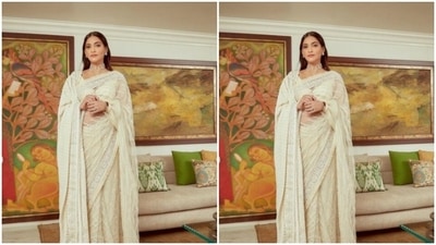 In a statement pearl embedded neck choker, white ear studs, a red bangle and a diamond finger ring, Sonam further accessorised her look for the day.&nbsp; (Instagram/@sonamkapoor)