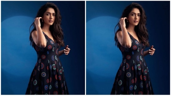 Mrunal can be seen wearing a stunning black flared midi featuring firework floral pattern all over the dress. The actress redefines simplicity and grace, as she strikes some breathtaking poses for the camera, (Instagram/@mrunalthakur)
