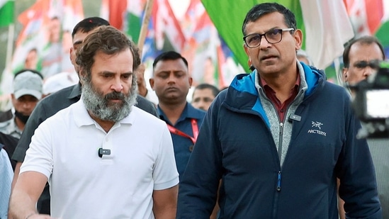 Former Reserve bank of India (RBI) governor Raghuram Rajan with Congress leader Rahul Gandhi as he joins the party's Bharat Jodo Yatra, in Sawai Madhopur on Wednesday. (ANI Photo)(AICC)