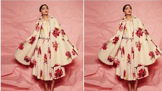 Sonam decked up in a white long frock featuring floral patterns in shades of red and yellow, and added a dramatic cape of the same print around her shoulders. (Instagram/@sonamkapoor)