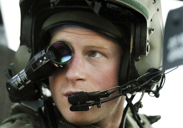 In this Dec. 12, 2012 file photo Britain's Prince Harry or just plain Captain Wales as he is known in the British Army, wears his monocle gun sight as he sits in the front seat of his cockpit at the British-controlled flight-line in Camp Bastion, southern Afghanistan. (John Stillwell, File/ AP Photo) In this Dec. 12, 2012 file photo Britain's Prince Harry or just plain Captain Wales as he is known in the British Army, wears his monocle gun sight as he sits in the front seat of his cockpit at the British-controlled flight-line in Camp Bastion, southern Afghanistan. (John Stillwell, File/ AP Photo)