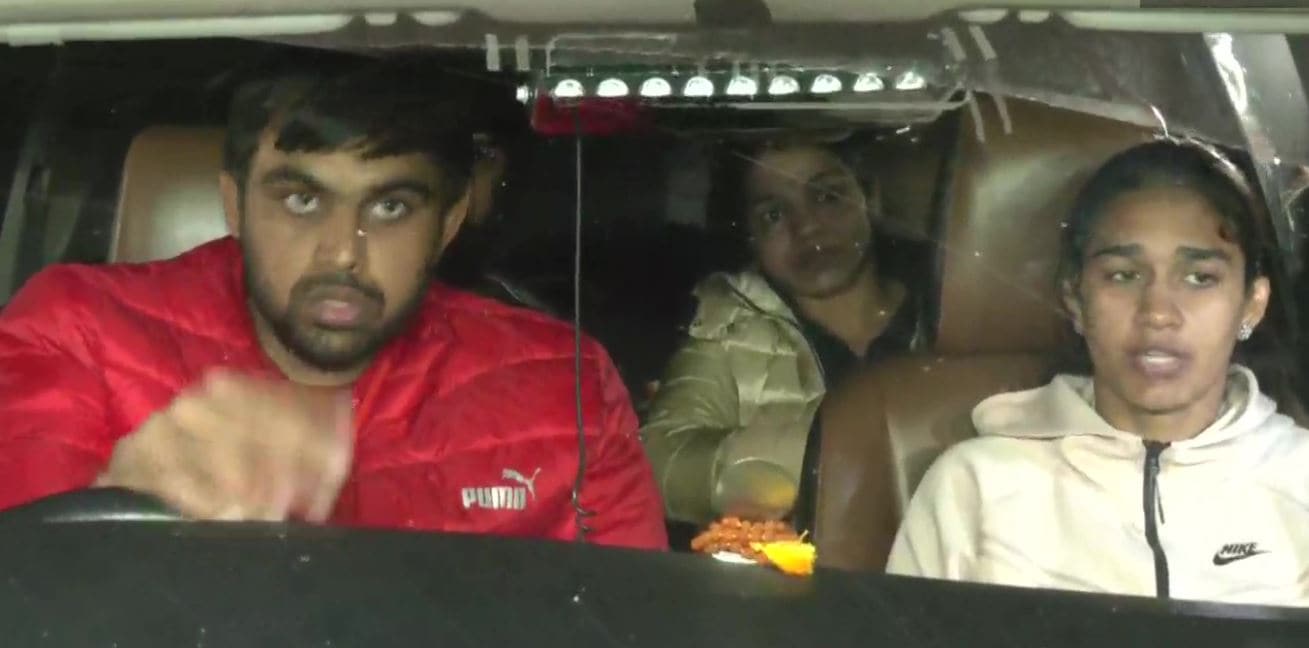 Protesting wrestlers arrive at Anurag Thakur's residence on Thursday night. (ANI)