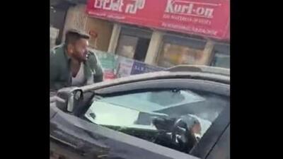 Man was dragged on car bonnet driven by woman in Bengaluru (Twitter Photo) Man was dragged on car bonnet driven by woman in Bengaluru (Twitter Photo)