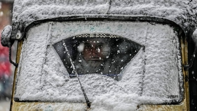 Srinagar recorded a minimum temperature of minus 0.1 degrees Celsius on January 18 night, up from minus 1.4 degrees Celsius the night before. Qazigund, the gateway to the Valley, registered a low of minus 0.6 degrees Celsius. (AP) Srinagar recorded a minimum temperature of minus 0.1 degrees Celsius on January 18 night, up from minus 1.4 degrees Celsius the night before. Qazigund, the gateway to the Valley, registered a low of minus 0.6 degrees Celsius. (AP)