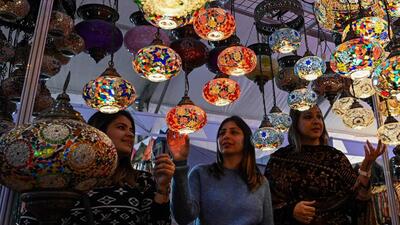 Visitors at a trade fair in Amritsar (AFP) Visitors at a trade fair in Amritsar (AFP)