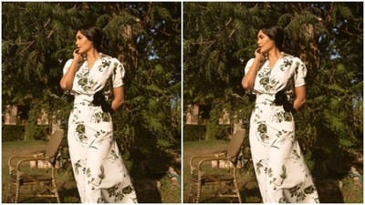 Esha’s dress came with collar details, short puffed sleeves, and a wraparound detail. The dress also featured two statement black flower patterns on one side of the waist. (Instagram/@egupta) Esha’s dress came with collar details, short puffed sleeves, and a wraparound detail. The dress also featured two statement black flower patterns on one side of the waist. (Instagram/@egupta)