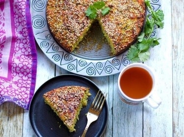 A savory cake made from a mixture of lentils, rice, and vegetables, Handvo is a popular Gujarati dish that is typically served as a snack or breakfast. (pinterest)