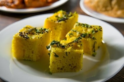 A steamed snack made from fermented chickpea flour, Dhokla is a popular Gujarati dish that can be served as a breakfast or a snack. (Pixabay)