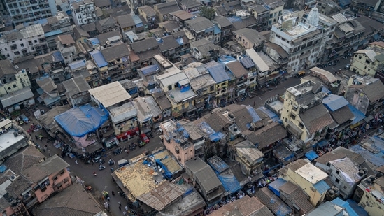 An aerial view of Kamathipura, as seen on January 6. Pankaj Kapoor, MD and CEO of the real estate research firm Liases Foras, told HT the stigma attached to Kamathipura and its decaying neighbourhood may mean a realty rate not commensurate with south Mumbai rates in the new development, “But even if one were to calculate at a conservative <span class='webrupee'>₹</span>25,000 per sq ft, Kamathipura’s free sale component will fetch about <span class='webrupee'>₹</span>6,000 crore.” (Satish Bate / HT Photo)