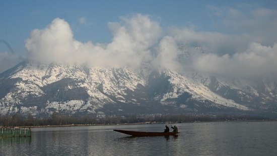 Snowfall and light rain in the hill states of northern India due to western disturbances led to the closure of roads and impacted flight operations on Friday. (HT Photo/Waseem Andrabi)