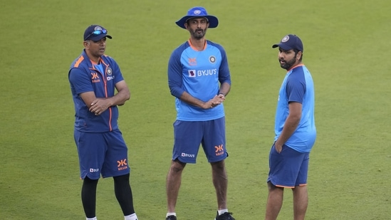 India's captain Rohit Sharma, right, and batting coach Vikram Rathour, center, listen to head coach Rahul Dravid, left, during a training session ahead of the second one-day international cricket match between India and New Zealand in Raipur, India, Friday, Jan. 20, 2023.(AP)