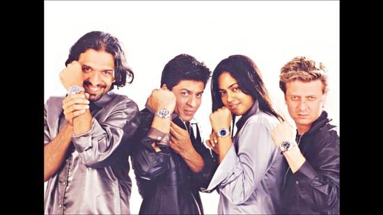 Posing with Shah Rukh Khan for an Omega watch advertisment Posing with Shah Rukh Khan for an Omega watch advertisment