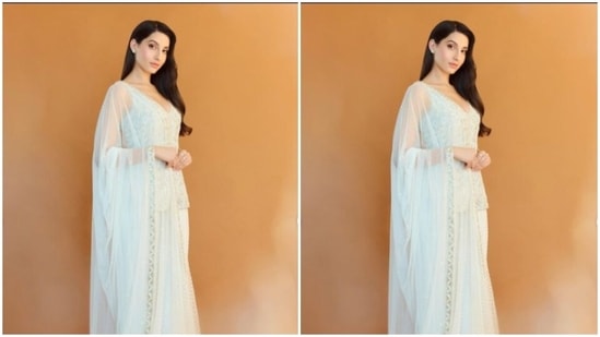 Nora played muse to fashion designer Ritika Mirchandani and picked a sheer white ethnic ensemble from the shelves of the designer.&nbsp;(Instagram/@norafatehi)