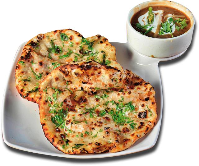 Put a little butter on a hot kulcha and suddenly the flavour of the kulcha will soar into another dimension Put a little butter on a hot kulcha and suddenly the flavour of the kulcha will soar into another dimension