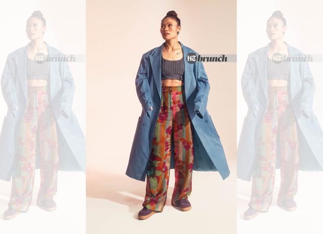 Ashalata says, “The women’s football team is emotional, in my experience. When we don’t perform, we get hurt. And to build up that enthusiasm again is quite difficult. As a captain, I found it quite hard to overcome the hard times and build team morale”; Overcoat by House of Khaddar; Bralette by Namrata Joshipura; Pants by Capisvirleo; Earrings by Tanvi Garg Studio; Shoes by Birkenstock (Vidushii Gupta) Ashalata says, “The women’s football team is emotional, in my experience. When we don’t perform, we get hurt. And to build up that enthusiasm again is quite difficult. As a captain, I found it quite hard to overcome the hard times and build team morale”; Overcoat by House of Khaddar; Bralette by Namrata Joshipura; Pants by Capisvirleo; Earrings by Tanvi Garg Studio; Shoes by Birkenstock (Vidushii Gupta)