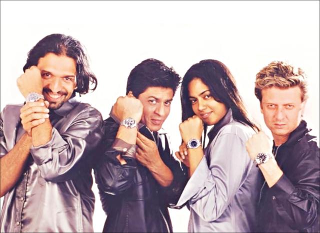 Posing with Shah Rukh Khan for an Omega watch advertisment Posing with Shah Rukh Khan for an Omega watch advertisment
