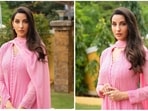 Nora Fatehi recently treated her Instagram handle of more than 43.9 million followers with stunning photos of herself in a pink salwar suit. This is the same suit she wore in the music video Achha Sila Diya which also features Rajkummar Rao. (Instagram/@norafatehi)