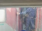 One windowpane of coach number C-6 was shattered in the incident. (Twitter) One windowpane of coach number C-6 was shattered in the incident. (Twitter)