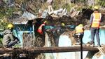 The dismantling work of two badly damaged hotels and two houses in Manohar Bagh in Joshimath town was restarted on Saturday. (ANI Photo) The dismantling work of two badly damaged hotels and two houses in Manohar Bagh in Joshimath town was restarted on Saturday. (ANI Photo)