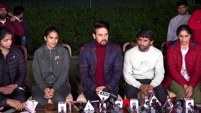Union Minister of Sports and Youth Affairs Anurag Thakur along with wrestlers Bajrang Punia, Vinesh Phogat, Sakshee Malikkh and Babita Phogat addresses a joint press conference regarding the wrestlers' protest against the Wrestling Federation of India (WFI) and its chief Brij Bhushan Sharan Singh against whom sexual harassment allegations were made, at his residence, in New Delhi on Friday. (ANI Photo) (ANI) Union Minister of Sports and Youth Affairs Anurag Thakur along with wrestlers Bajrang Punia, Vinesh Phogat, Sakshee Malikkh and Babita Phogat addresses a joint press conference regarding the wrestlers' protest against the Wrestling Federation of India (WFI) and its chief Brij Bhushan Sharan Singh against whom sexual harassment allegations were made, at his residence, in New Delhi on Friday. (ANI Photo) (ANI)