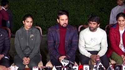 Union Minister of Sports and Youth Affairs Anurag Thakur along with wrestlers Bajrang Punia, Vinesh Phogat, Sakshee Malikkh and Babita Phogat addresses a joint press conference regarding the wrestlers' protest against the Wrestling Federation of India (WFI) and its chief Brij Bhushan Sharan Singh against whom sexual harassment allegations were made, at his residence, in New Delhi on Friday. (ANI Photo) (ANI) Union Minister of Sports and Youth Affairs Anurag Thakur along with wrestlers Bajrang Punia, Vinesh Phogat, Sakshee Malikkh and Babita Phogat addresses a joint press conference regarding the wrestlers' protest against the Wrestling Federation of India (WFI) and its chief Brij Bhushan Sharan Singh against whom sexual harassment allegations were made, at his residence, in New Delhi on Friday. (ANI Photo) (ANI)