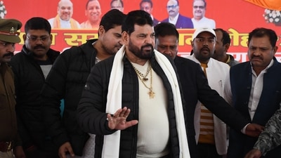 Wrestling Federation of India (WFI) president Brij Bhushan Sharan Singh (C) arrives to address a press conference in Gonda on January 20, 2023, following allegations of sexual harassment to wrestlers by members of the WFI. (Photo by AFP) (AFP) Wrestling Federation of India (WFI) president Brij Bhushan Sharan Singh (C) arrives to address a press conference in Gonda on January 20, 2023, following allegations of sexual harassment to wrestlers by members of the WFI. (Photo by AFP) (AFP)