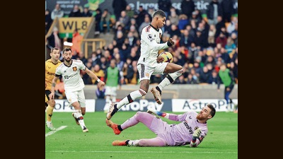 Marcus Rashford (centre) has sprung to life, as has the rest of Manchester United, under new coach Erik ten Hag. Below, United play the Wolverhampton Wanderers, on December 31. (Reuters) Marcus Rashford (centre) has sprung to life, as has the rest of Manchester United, under new coach Erik ten Hag. Below, United play the Wolverhampton Wanderers, on December 31. (Reuters)