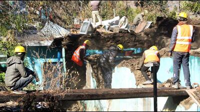 The dismantling work of two badly damaged hotels and two houses in Manohar Bagh in Joshimath town was restarted on Saturday. (ANI Photo) The dismantling work of two badly damaged hotels and two houses in Manohar Bagh in Joshimath town was restarted on Saturday. (ANI Photo)
