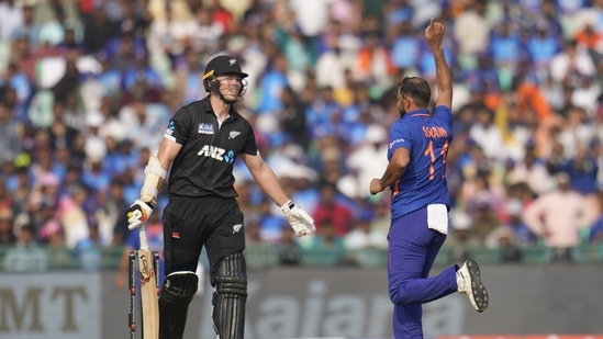 India's Mohammed Shami, right, celebrates the wicket of New Zealand's Michael Bracewell, left, during the second one-day international cricket match between India and New Zealand in Raipur, India, Saturday, Jan. 21, 2023.(AP)