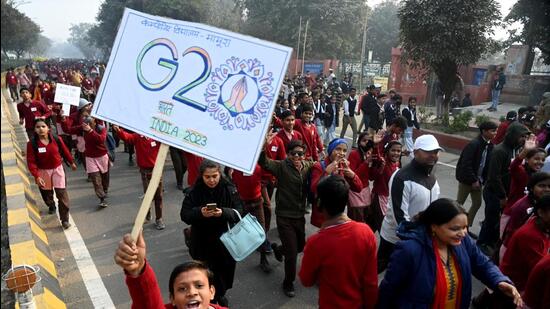 Noida, India- January 21, 2023: Noida resident along with school students participate in "Run for G-20" event organized by Noida authority, Sector 21A.Over 5,000 people participated in the 'Run for G-20' walk organized in Gautam Budh Nagar on Saturday at Noida Stadium in Sector 21A. Participation included school children, residents as well as top administrative and police officials like Noida and Greater Noida, in Noida, India, on Saturday, January 21, 2023. (Photo by Sunil Ghosh / Hindustan Times) To go with Ashni’s story