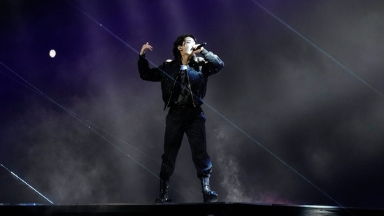 South Korean singer Jung Kook performs at the opening ceremony prior he World Cup, group A soccer match between Qatar and Ecuador at the Al Bayt Stadium in Al Khor, Sunday, Nov. 20, 2022. (AP Photo/Natacha Pisarenko)