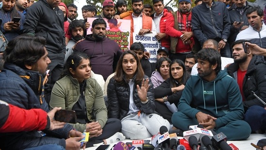 Wrestler Vinesh Phogat speaks to the media accusing WFI president Brij Bhushan Sharan Singh of sexual harassment during a protest against Wrestling Federation of India, at Jantar Mantar, in New Delhi on Wednesday.(ANI)