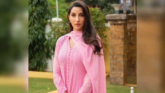 Nora Fatehi keeps her look simple yet very chic and complements her suit with minimal jewellery and makeup. (Instagram/@norafatehi)