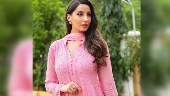 Nora Fatehi's suit features chikankari embroidery work with front-open style. (Instagram/@norafatehi)