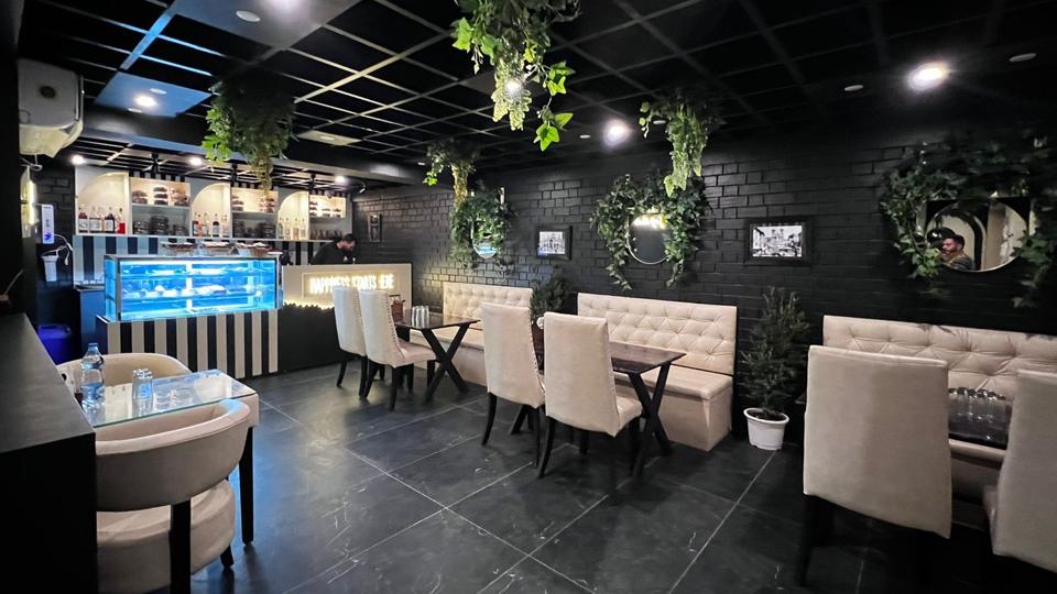 Interior of Bake My Cake cafe in Baramulla town. (HT Photo) Interior of Bake My Cake cafe in Baramulla town. (HT Photo)