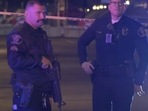 Screenshot from a viodeo shows police officers standing guard at the scene of a shooting at Monterey Park, California. TNLA/Handout via REUTERS