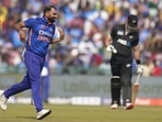 India's Mohammed Shami, left, celebrates the dismissal of New Zealand's Daryl Mitchell, right, during the second one-day international cricket match between India and New Zealand in Raipur. India's Mohammed Shami, left, celebrates the dismissal of New Zealand's Daryl Mitchell, right, during the second one-day international cricket match between India and New Zealand in Raipur.