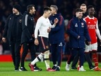 Man United's Lisandro Martinez alongside Arsenal's Bukayo Saka after the match
