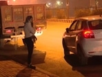 In a video clip going viral on social media, DCW chief Swati Maliwal is seen being harassed by a car driver and he drags her with his car after she takes a hold of him.