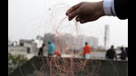 The banned ‘deadly’ plastic kite string, also known as the ‘China dor’, that has proved fatal for many lives and critically injured people as well as birds, continues to be sold in markets in blatant violation of rules despite stringent steps taken by the Ludhiana administration to put a check on its sale. (HT Photo) The banned ‘deadly’ plastic kite string, also known as the ‘China dor’, that has proved fatal for many lives and critically injured people as well as birds, continues to be sold in markets in blatant violation of rules despite stringent steps taken by the Ludhiana administration to put a check on its sale. (HT Photo)