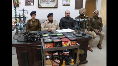 ADCP Shubham Aggarwal yielding about the recovery of banned hookahs from a restaurant in Sarabha Nagar, Ludhiana on Sunday. (HT Photo)