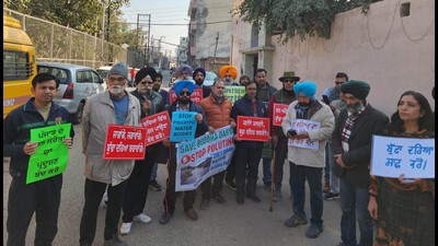 Ludhiana based environmentalists during an awareness walk near Buddha Nullah in Ludhiana on Sunday. (HT Photo)