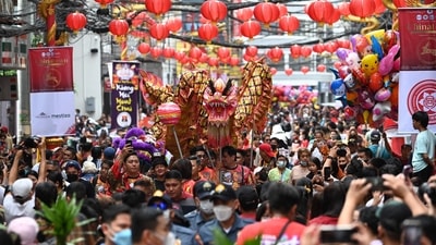 Lunar New Year, also known as the Chinese New Year or the Spring Festival is being celebrated today, January 22 by more than a billion people from China and Asia. In China, people rang in the Lunar New Year with large family gatherings and crowds visiting temples after the government lifted its strict “zero-COVID” policy, marking the biggest festive celebration since the pandemic began three years ago. (AFP) Lunar New Year, also known as the Chinese New Year or the Spring Festival is being celebrated today, January 22 by more than a billion people from China and Asia. In China, people rang in the Lunar New Year with large family gatherings and crowds visiting temples after the government lifted its strict “zero-COVID” policy, marking the biggest festive celebration since the pandemic began three years ago. (AFP)