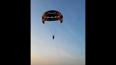 The image shows an elderly woman paragliding. (Instagram/@celinamoses)