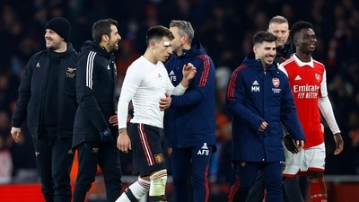 Man United's Lisandro Martinez alongside Arsenal's Bukayo Saka after the match (Action Images via Reuters)