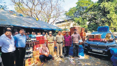 Sajana story Thane, India - January, 22, 2023: The state excise department have arrested two in connection with transporting Daman and Haryana manufactured and fake foreign liquors from Maharashtra from a godown in Bhiwandi. Meanwhile a bmw carrying the liquor bottles were also seized from a parking lot of a Kalyan based residency. The department has seized 291 boxes of alcohol in the investigation , in Thane, India, on,Sunday, January, 22, 2023. ( Praful Gangurde / HT Photo) Sajana story Thane, India - January, 22, 2023: The state excise department have arrested two in connection with transporting Daman and Haryana manufactured and fake foreign liquors from Maharashtra from a godown in Bhiwandi. Meanwhile a bmw carrying the liquor bottles were also seized from a parking lot of a Kalyan based residency. The department has seized 291 boxes of alcohol in the investigation , in Thane, India, on,Sunday, January, 22, 2023. ( Praful Gangurde / HT Photo)